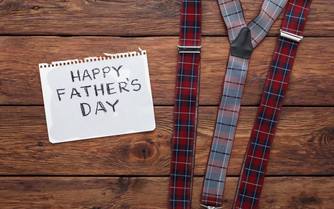 Happy Fathers Day card on cork texture background